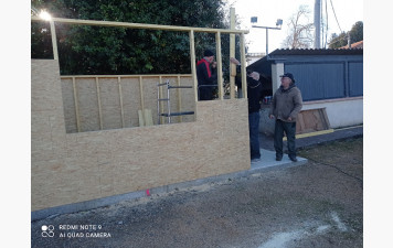 CONSTRUCTION DU LOCAL DE STOCKAGE MATERIEL